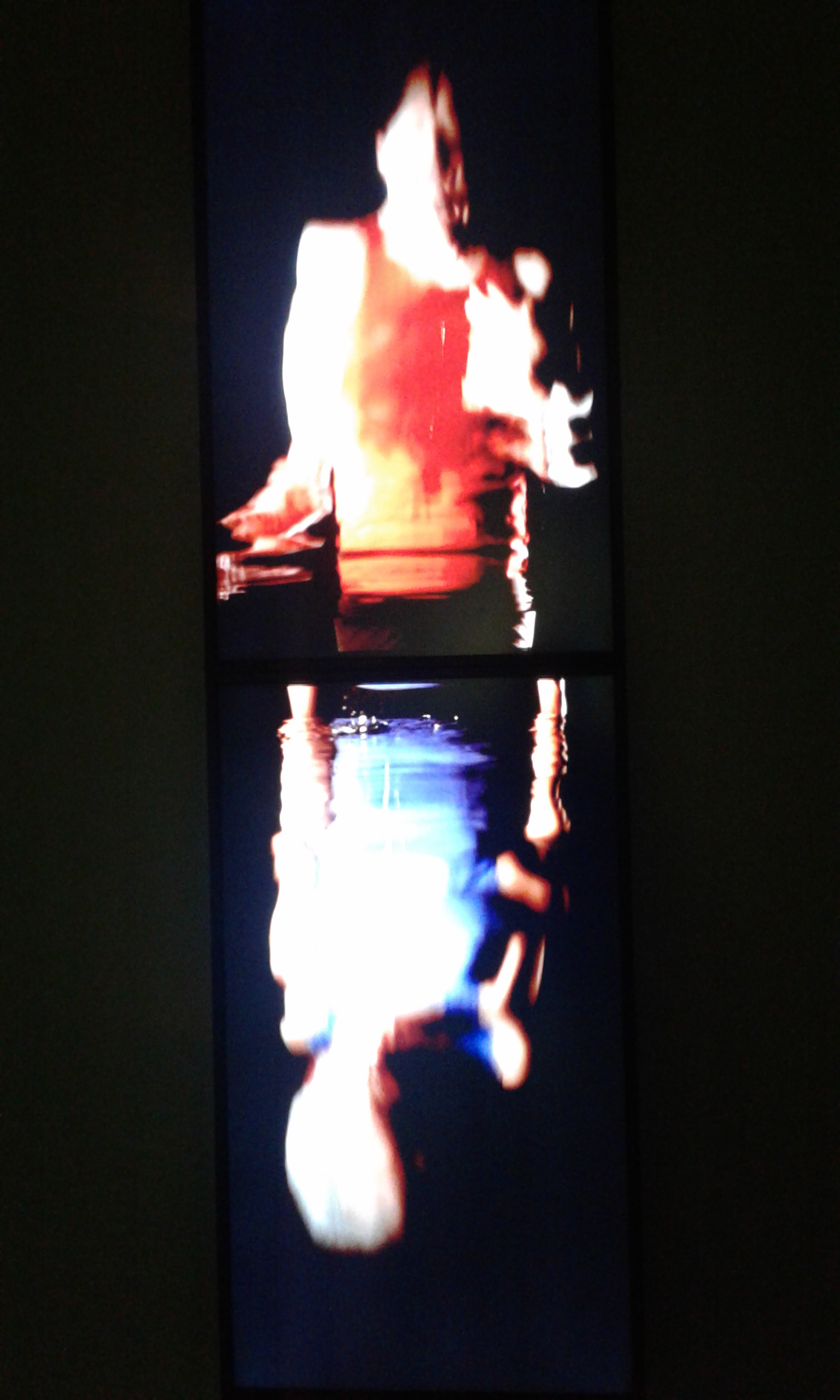 Bill Viola, Surrender, 2001. Color video diptych on two plasma displays mounted vertically on wall; 18:00 minutes. Performers: John Fleck, Weba Garretson.